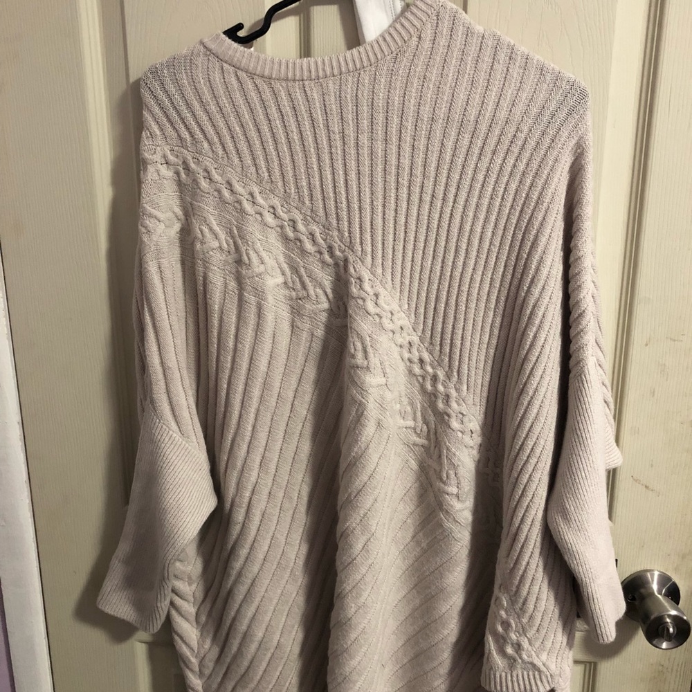 Knitted sweater/poncho